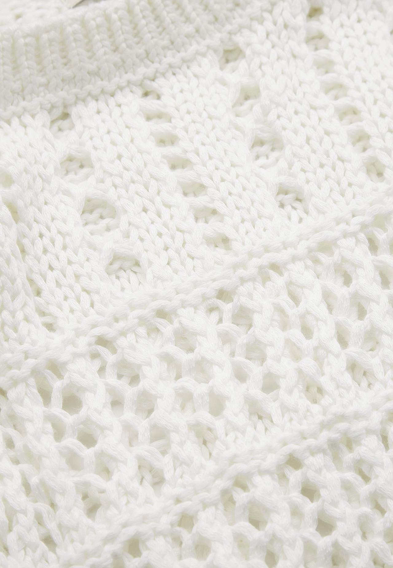 Dzianinowy sweter z ażurowym wzorem