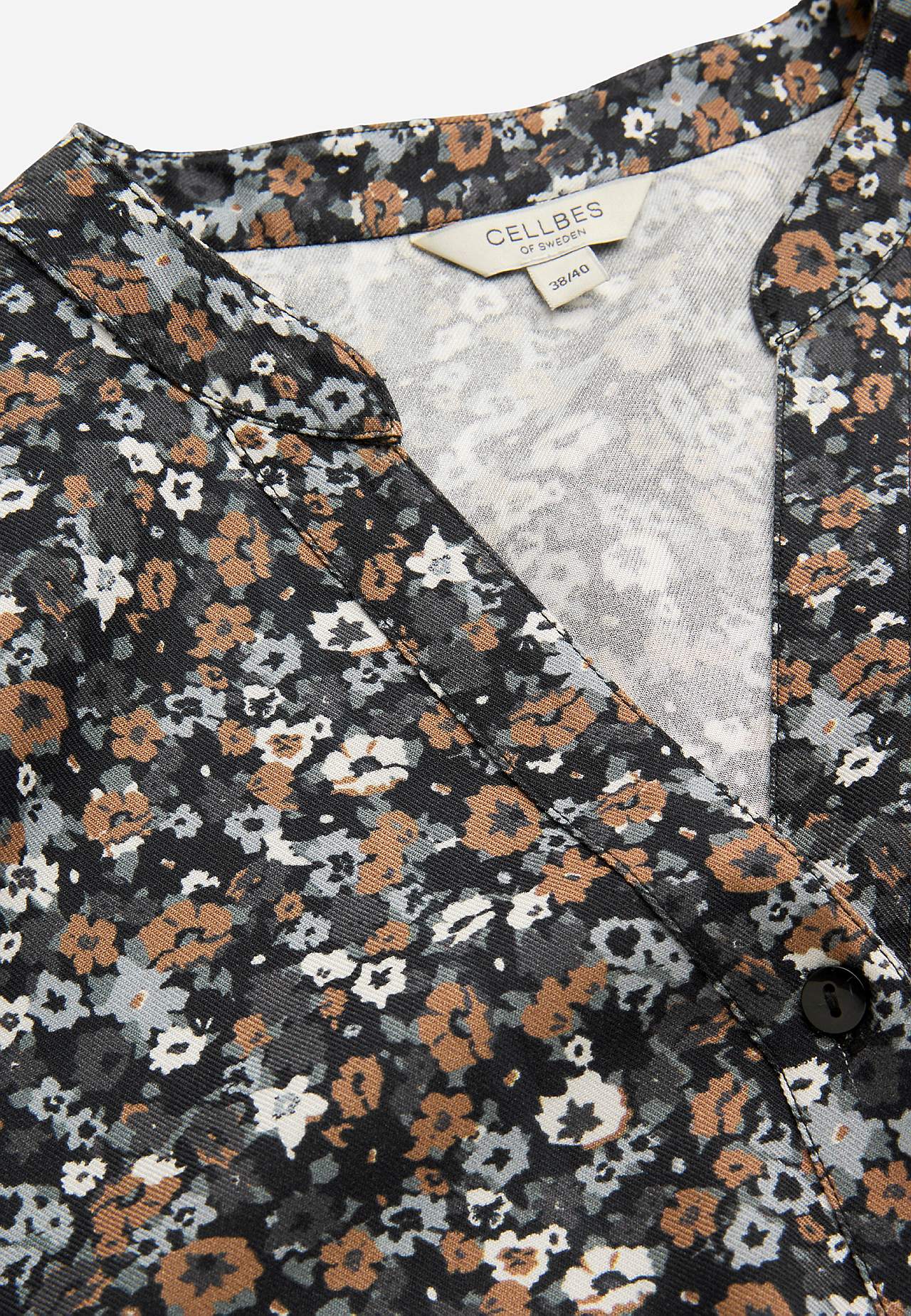 Tkana tunika z guzikami