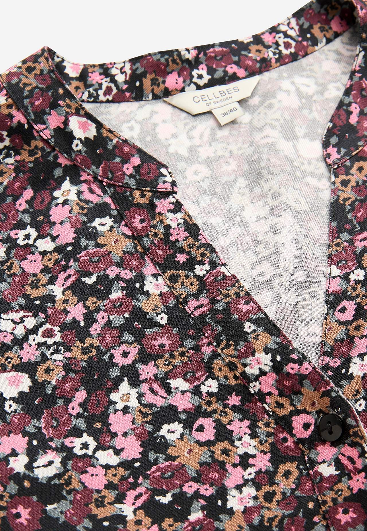 Tkana tunika z guzikami