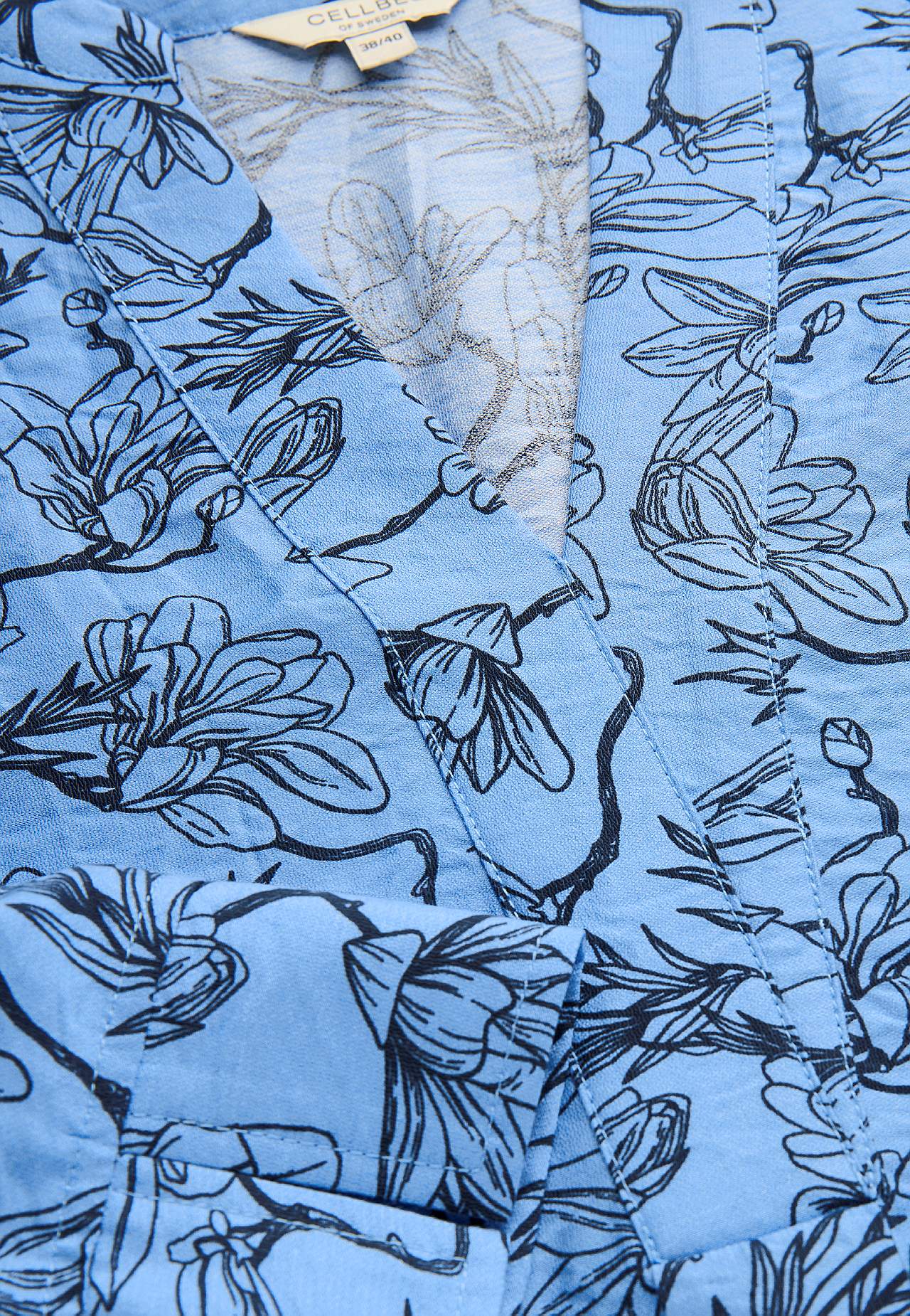 Tkana tunika z kieszeniami