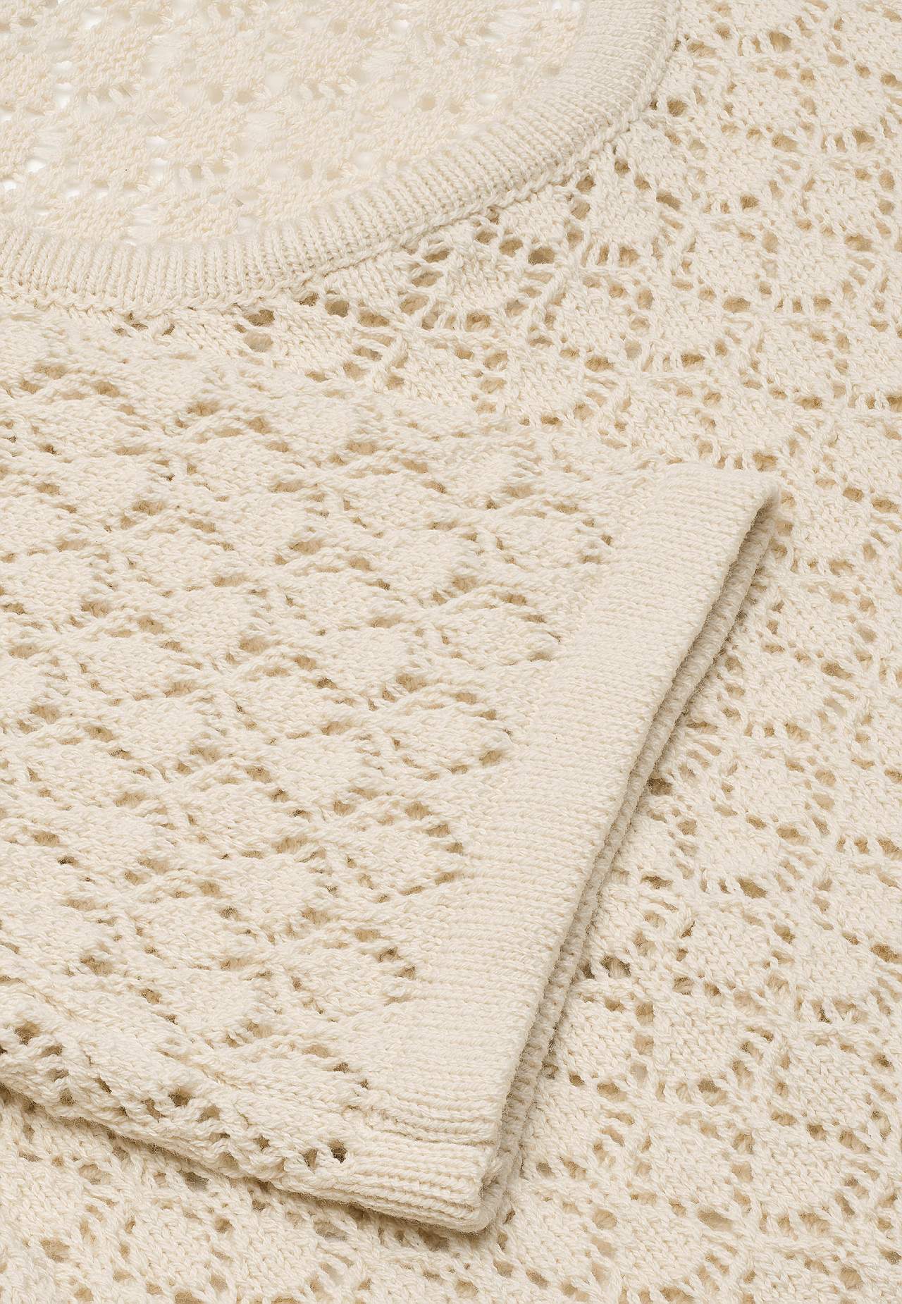 Dzianinowy sweter z ażurowym wzorem