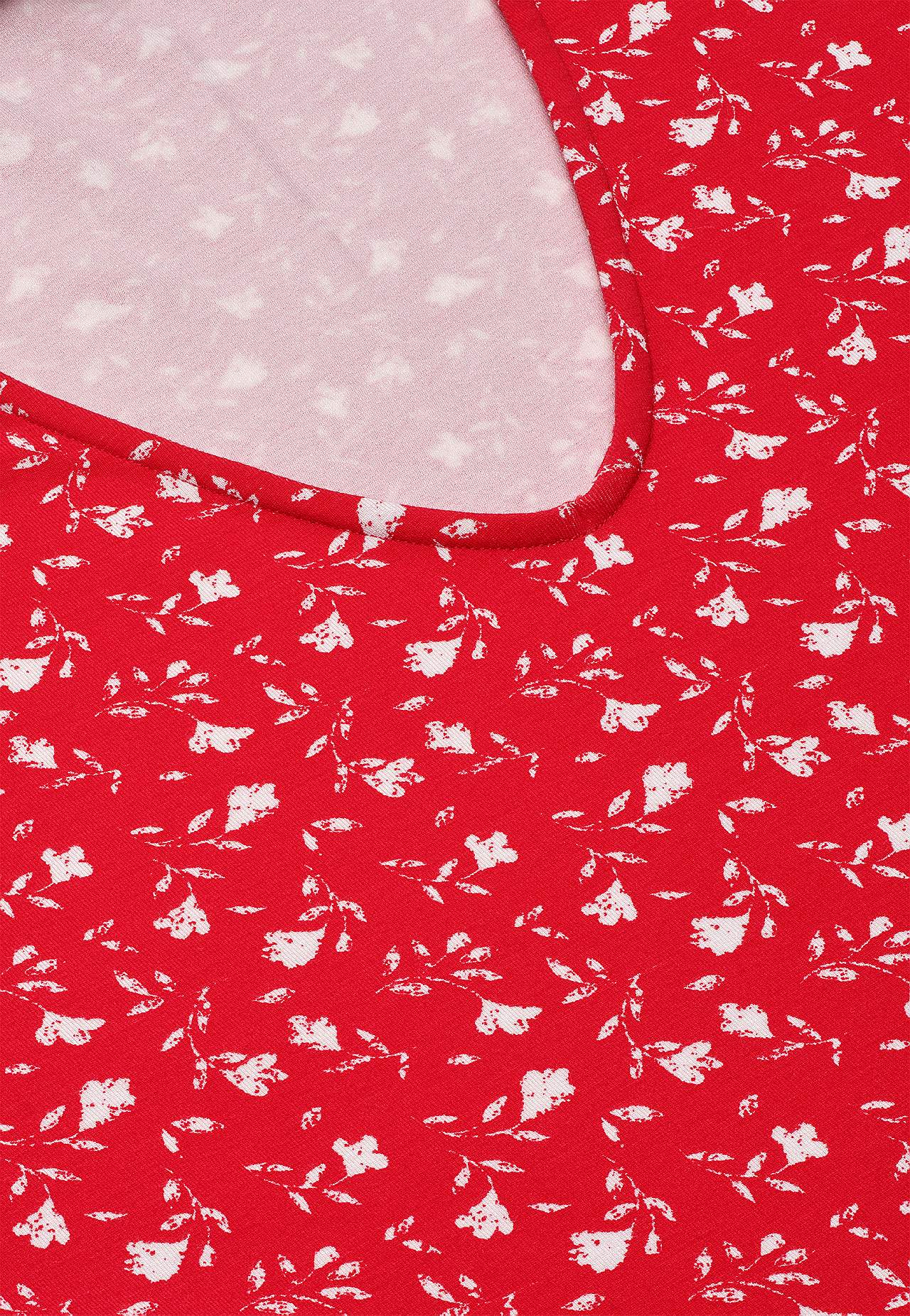 Dżersejowa sukienka w kwiaty z kieszeniami