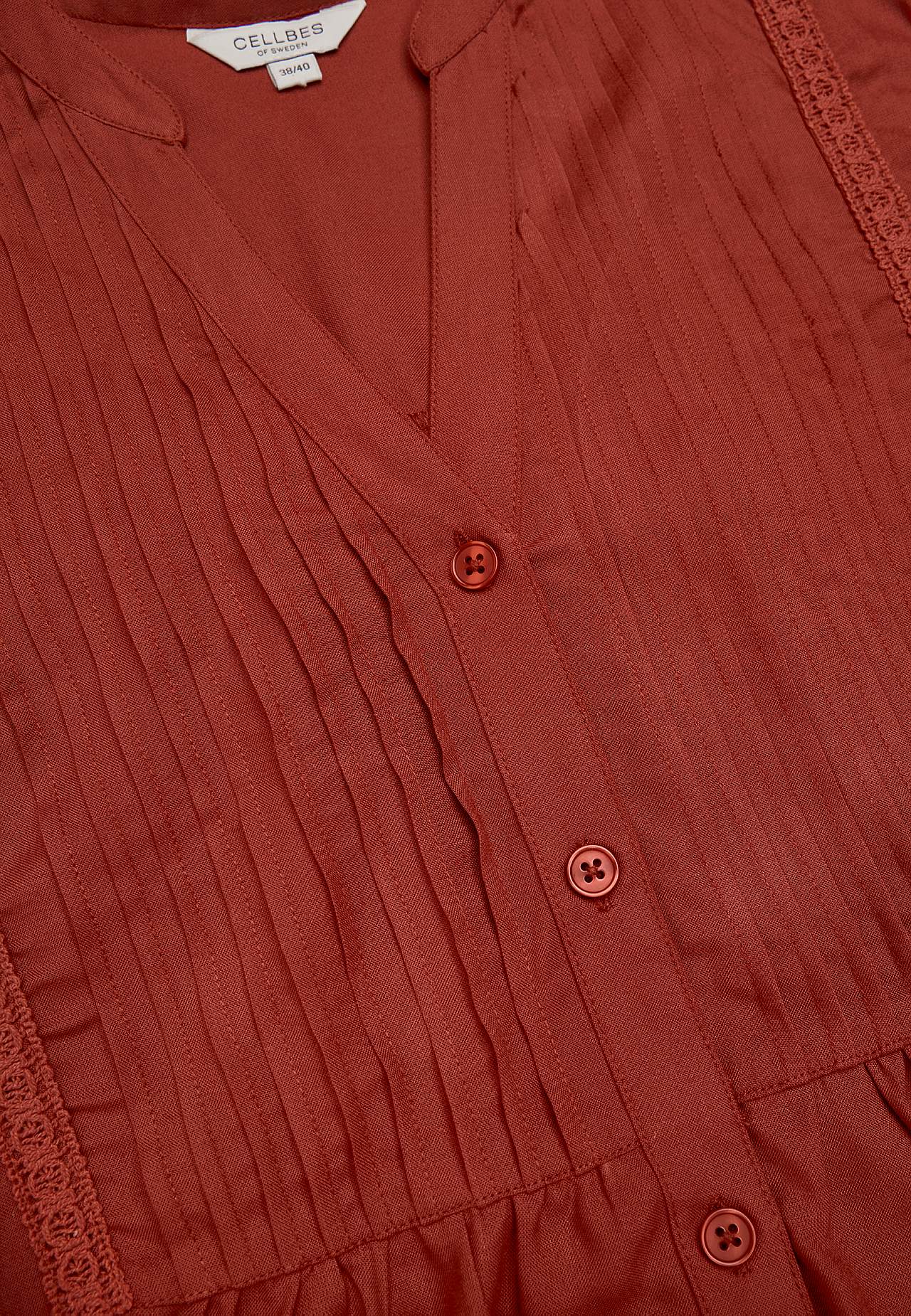 Tkana tunika z koronkowymi lamówkami