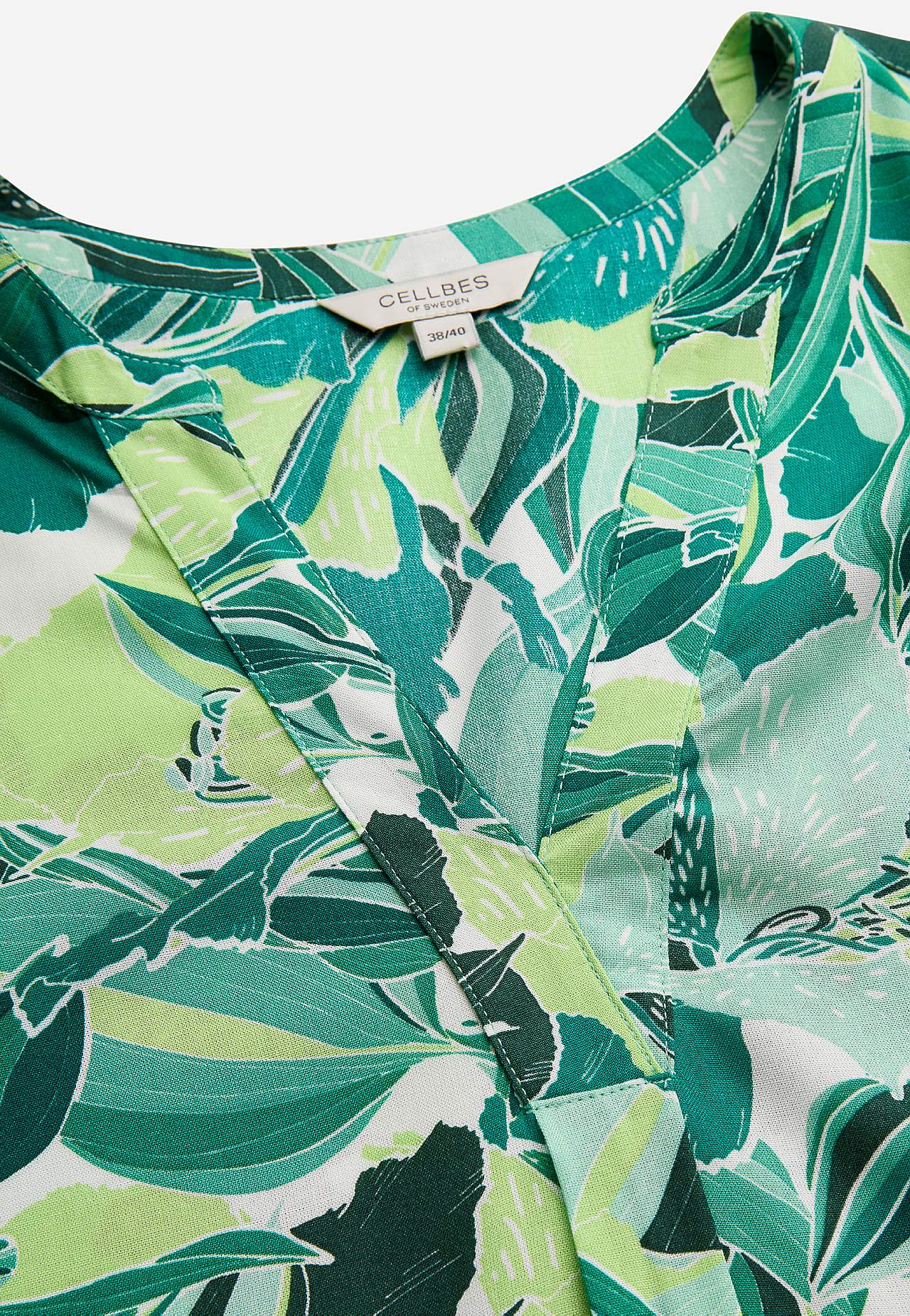 Tunika bez rękawów w kwiaty z kieszeniami