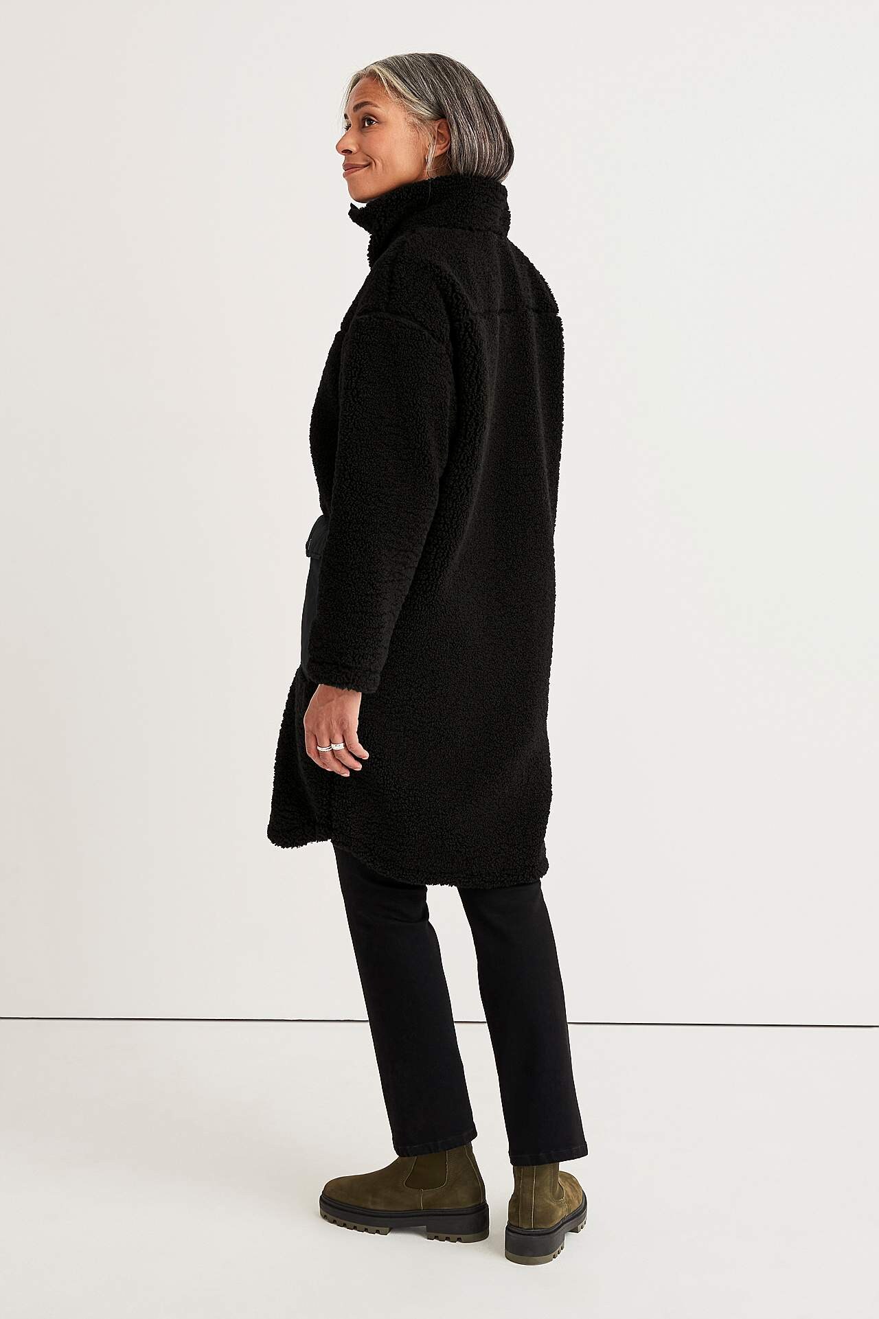 Pofalowana tunika z ściąganym golfem