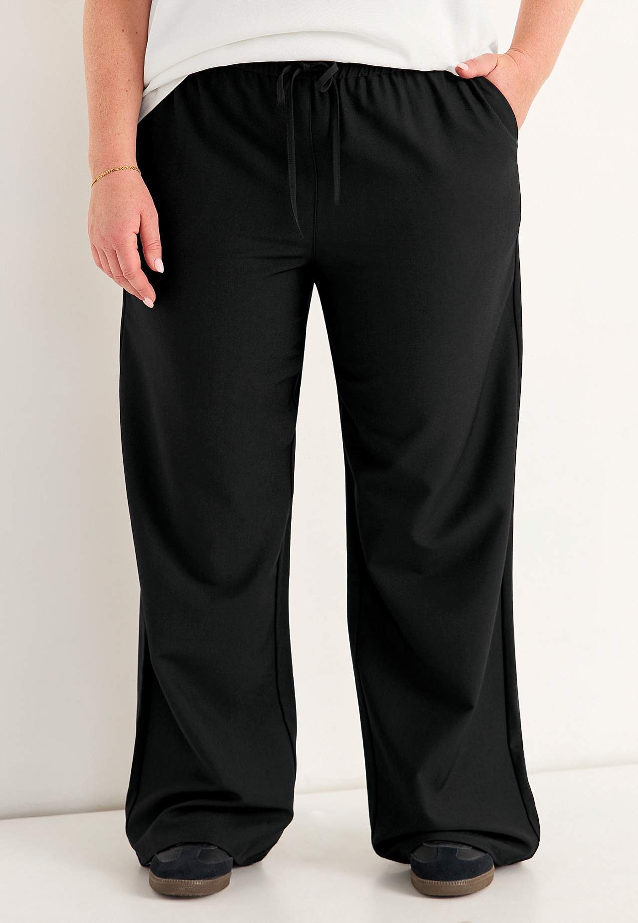 Eleganckie spodnie bez zapięcia Pia