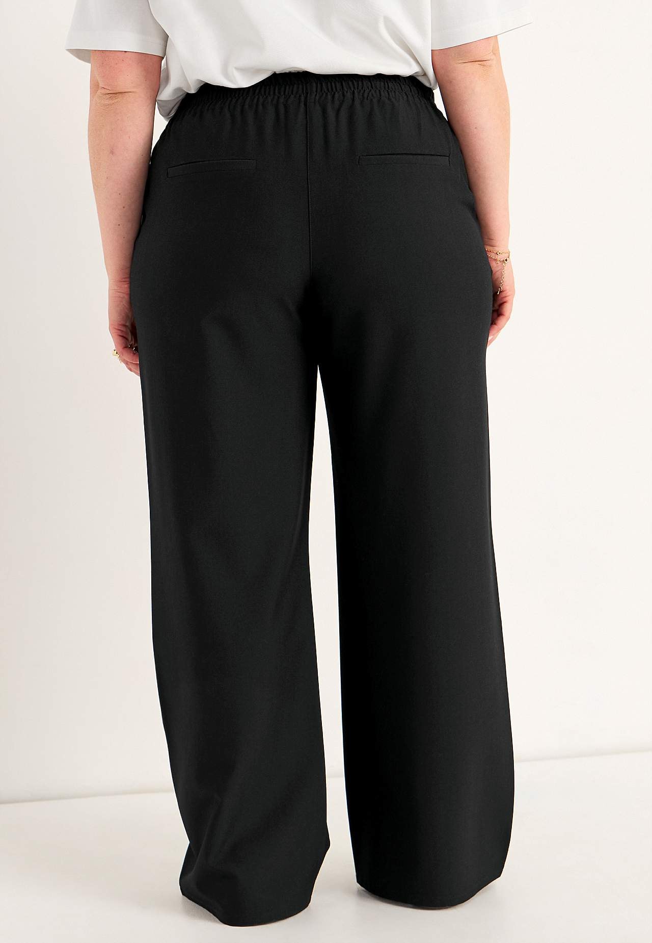 Eleganckie spodnie bez zapięcia Pia