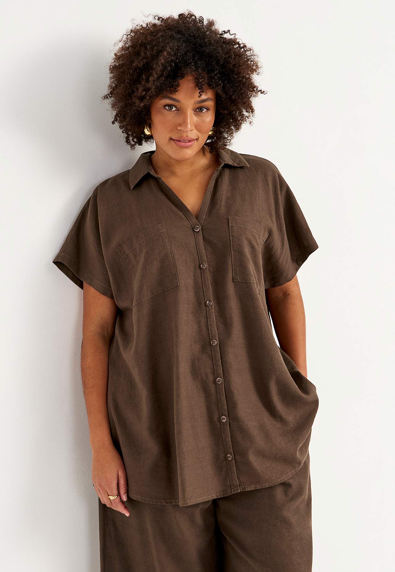 Lniana tunika z kieszeniami