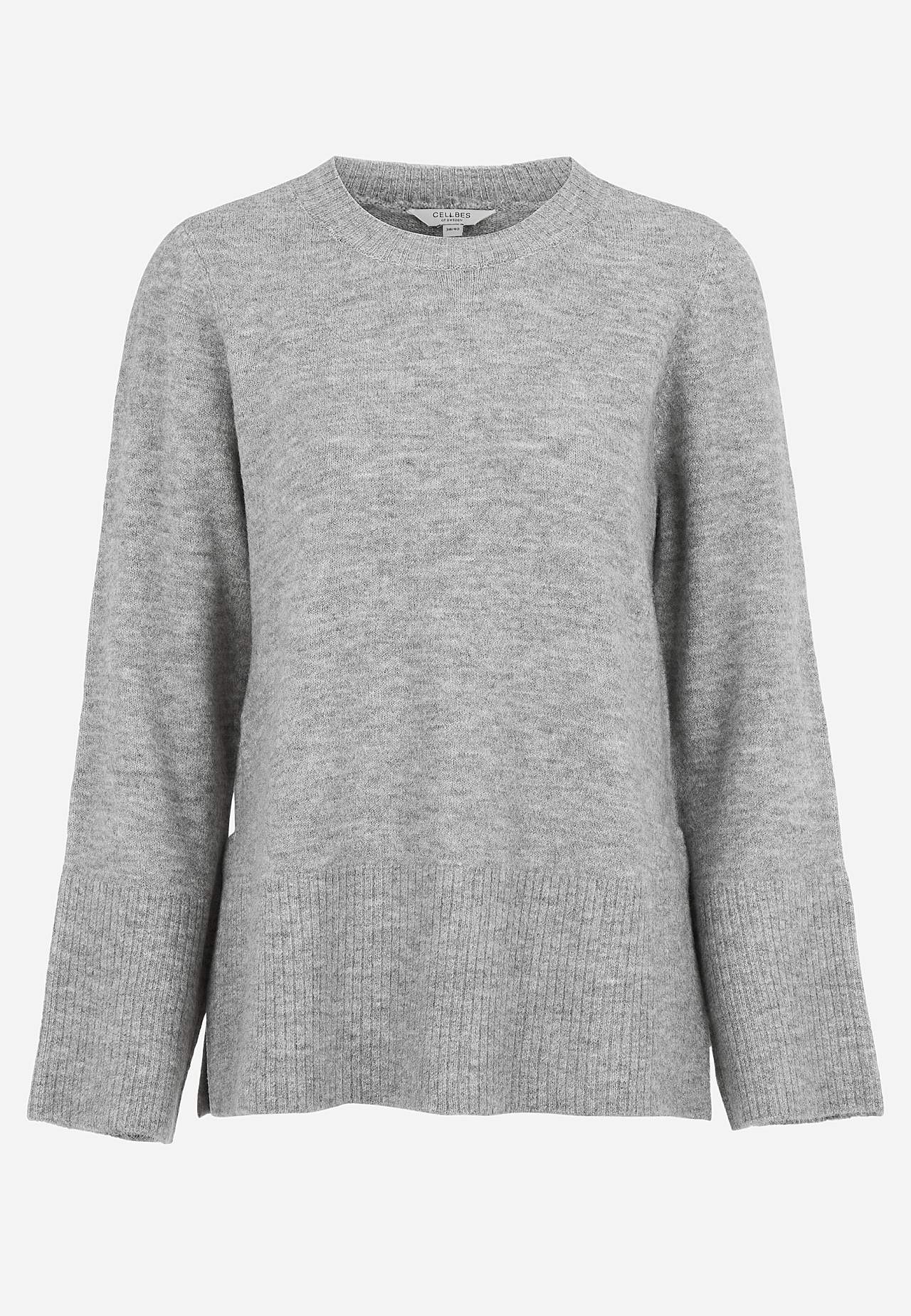 Dzianinowy sweter z rozcięciami