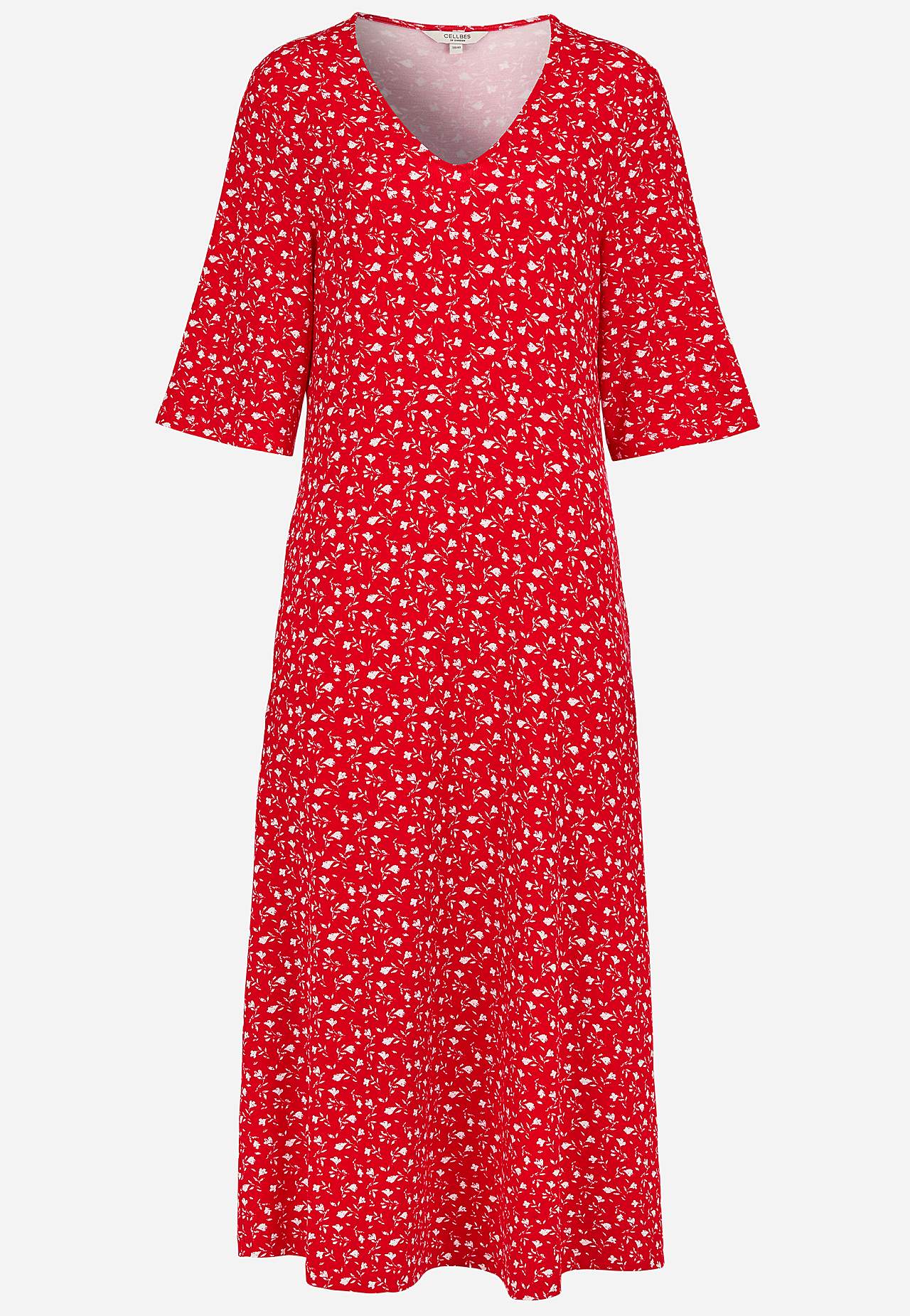 Dżersejowa sukienka w kwiaty z kieszeniami