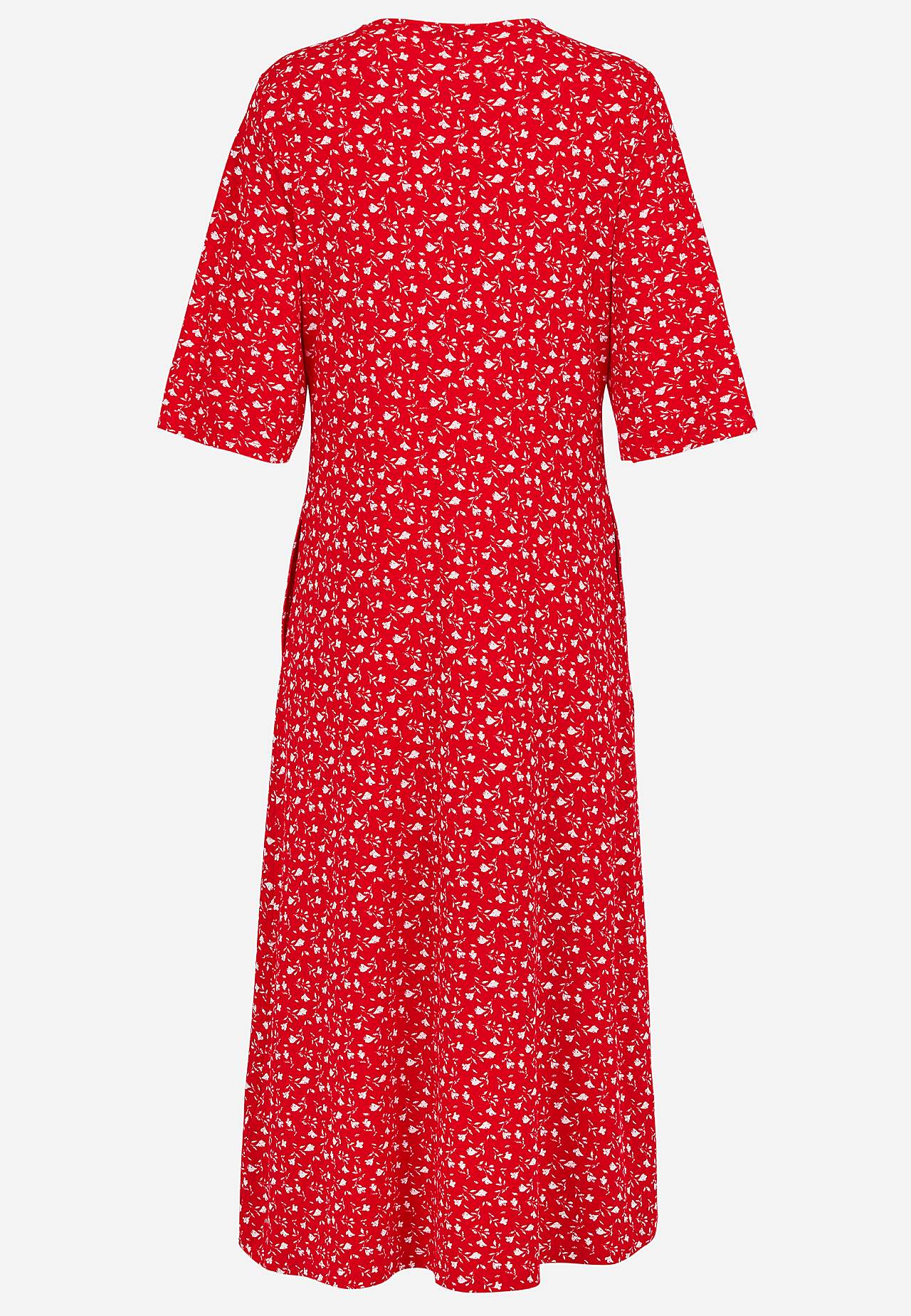 Dżersejowa sukienka w kwiaty z kieszeniami